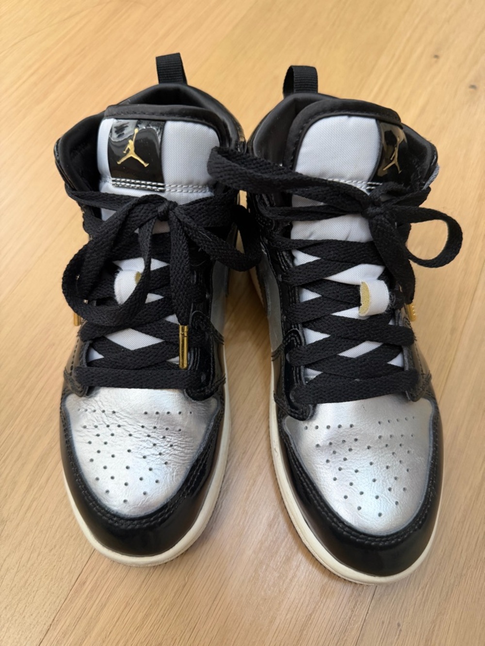 Air Jordan High Top Sneakers in Black and Metallic Silver